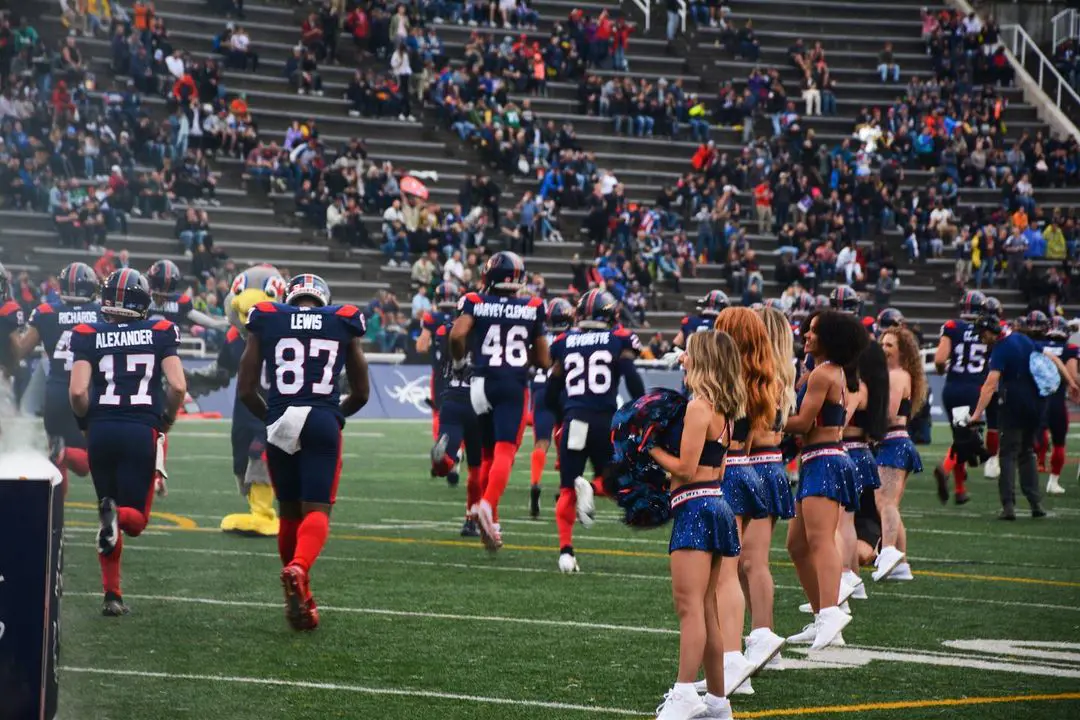 Montreal Alouettes Team along with their cheer leaders