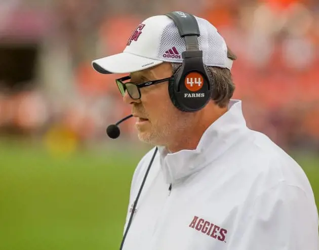 Football Coaches inform each other about the game's progress so that they can improve or maintain their performance.