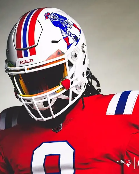 The red throwback kit with white helmet and vintage logo