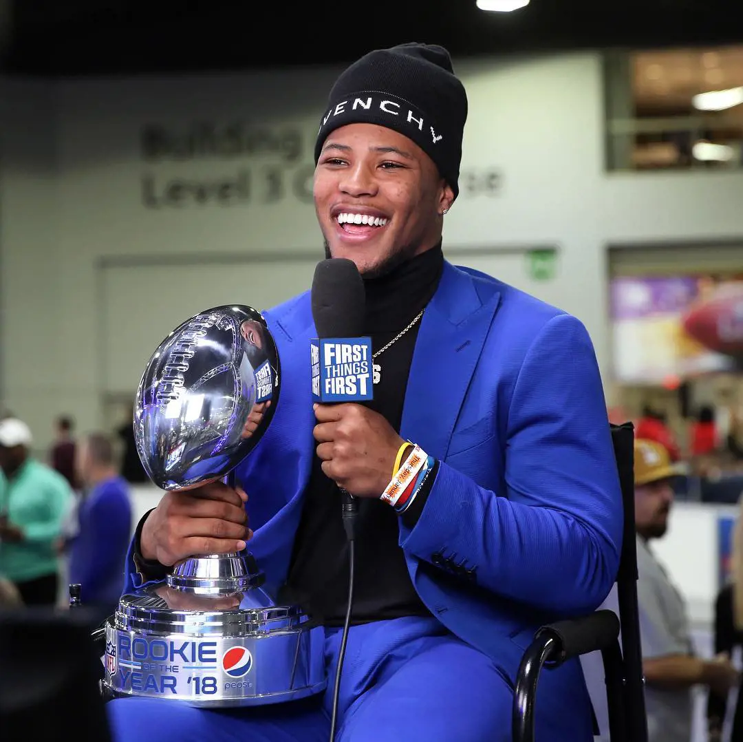 Saquon Barkley with his Pepsi Rookie of the Year Award