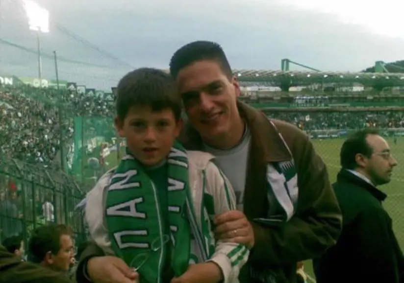 George and his father Matthew attending a football match in Athens, Greece.