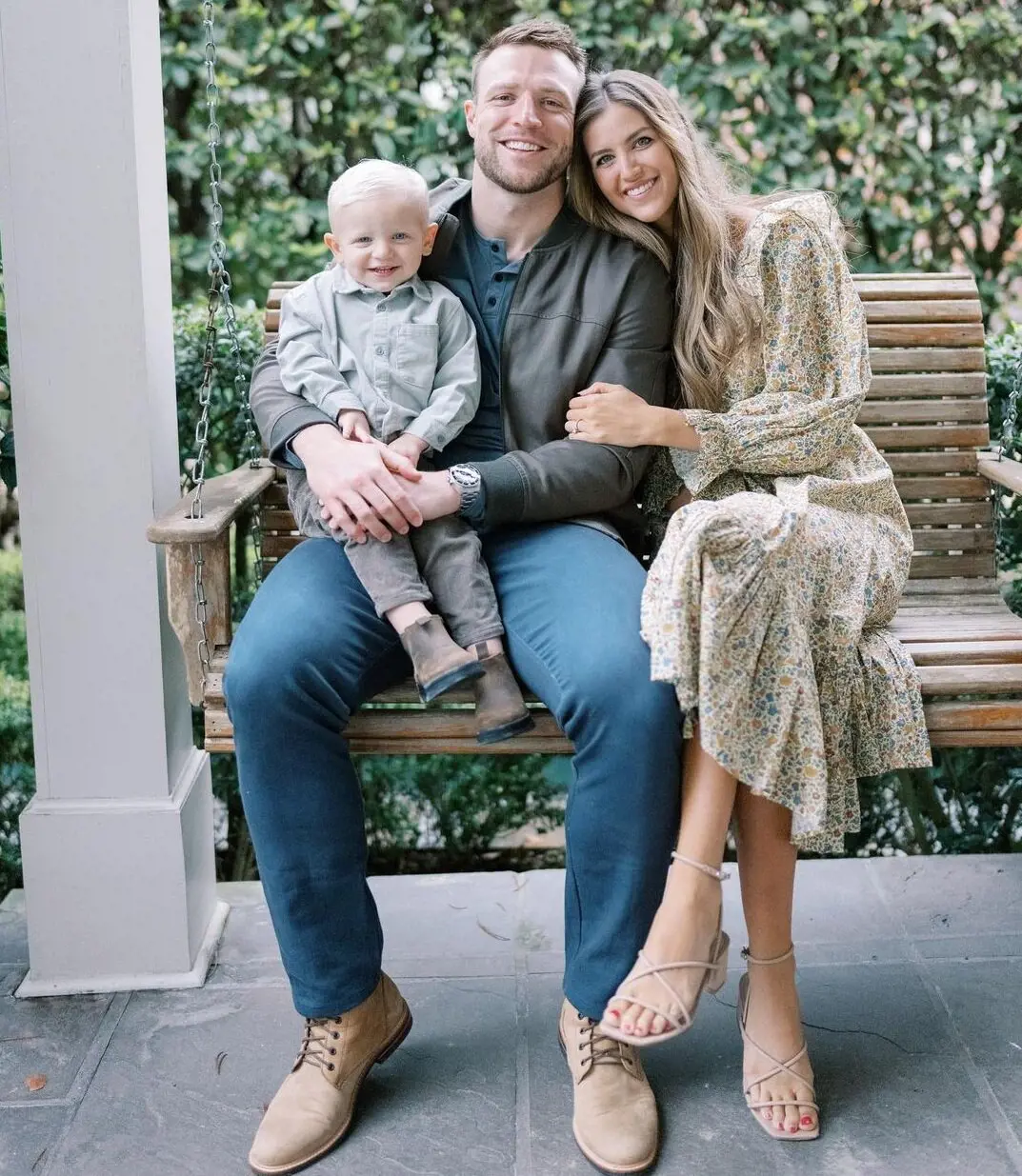 Taysom holding his son Beau with his partner Emily on Thanksgiving day on 25th November 2022.