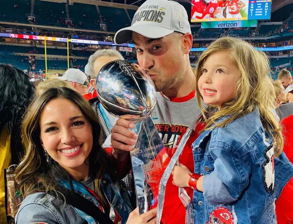 Mike Kafka with his partner Allison and daughter after his super bowl win on February 2, 2020, at Hard Rock Stadium in Miami Gardens, Florida.
