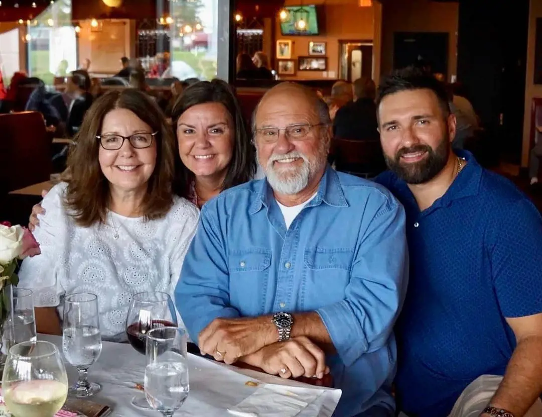 Mike and Debbie dining with Rob and Laura at a restaurant in 2022.