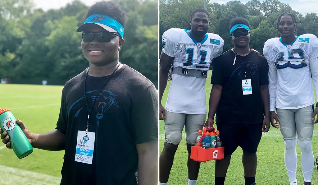 A Waterboy clicking photos with Carolina Panthers football player.