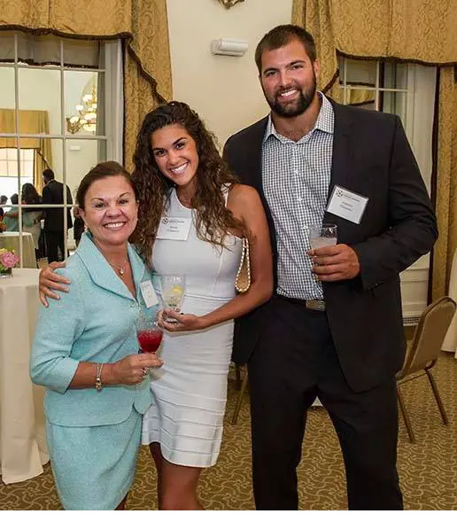 The 34-year-old former football player and his partner Maddy with Debi Wheeler at Center for Military Medicine Research.