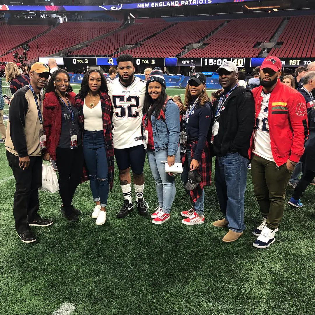 Elandon with his entire family on the ground after the New England Patriots game in February 2019.