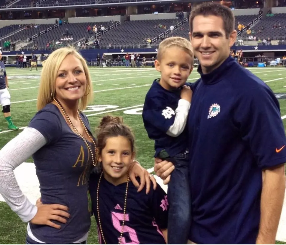 Joe with his partner and two older kids at Hard Rock Stadium in 2013.